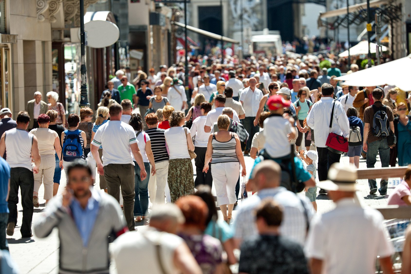A crowded pedestrian area with many people